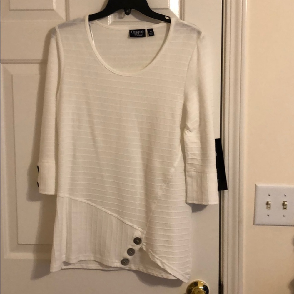 Off white top.